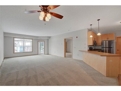 Walking into the unit, facing living/kitchen/door 