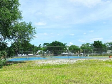 TENNIS COURTS BEHIND LOT AS WELL AS HORSE STABLES 
