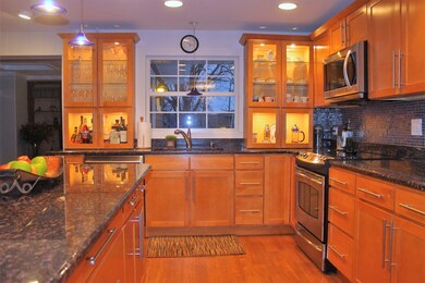 Granite counters throughout with a beautiful glass