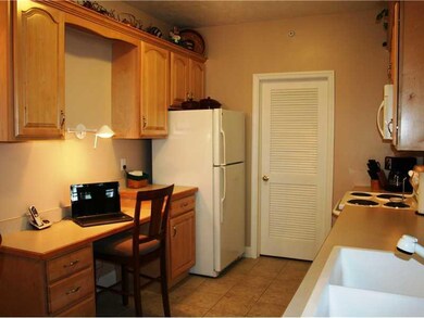 Kitchen. Kitchen with convenient laundry on same l