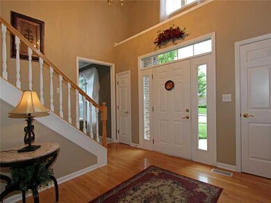 Entry. Grand two story foyer welcomes you into this home.  Notice not one, but two coat closets and lots of windows allowing in lots of natural light!
