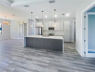 902 Alaska Ave, Lehigh Acres, FL 33971 - photo 3