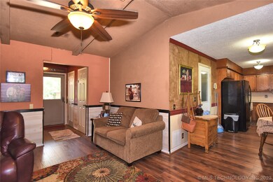 Entry with coat closet.  Vinyl flooring throughout