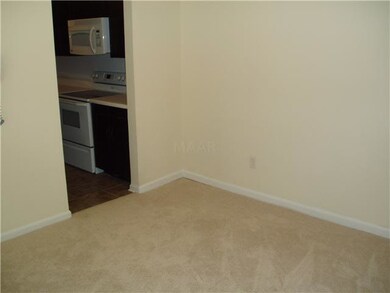 The dining room is quite spacious and adjoins the 