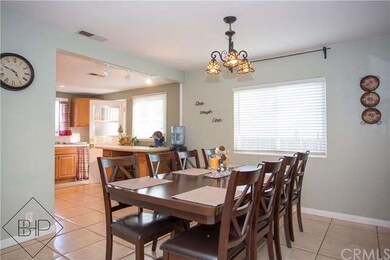 Large formal dining room ope to kitchen.