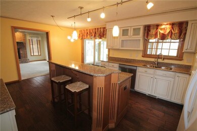 Beautiful newer kitchen with custom cabinetry, qua