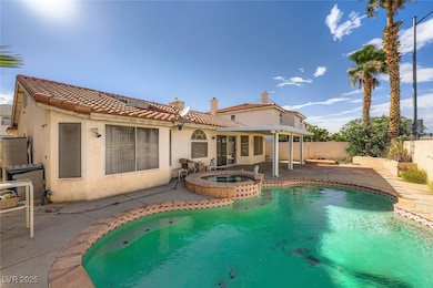 View of pool featuring a patio, a fenced backyard,