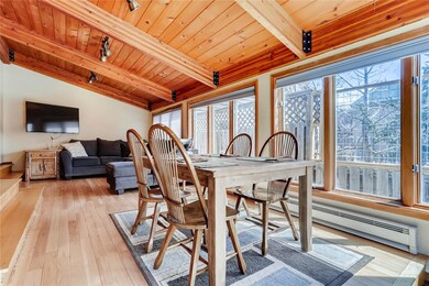 Sunny, south-side dining/TV room!  The back of the