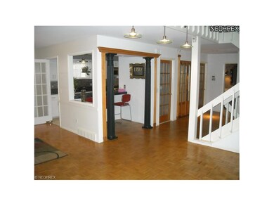 Hallway  with glassed closet and breakfast bar