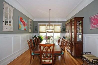 Formal Dining Room with wainscoting