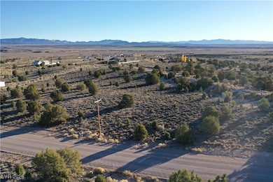 Overview of rural landscape with a mountain backdrop