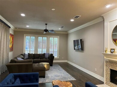 Family room with fireplace sitting area.  Sliders 