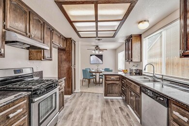 Virtual staged - Kitchen looking at Dining Room