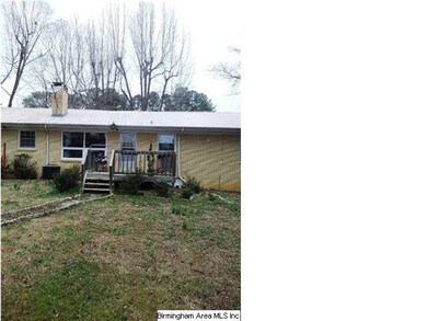 View of back of home with deck