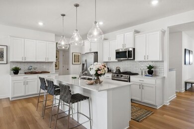 (Photo of a decorated model, actual homes finishes will vary) Imagine cooking a wonderful meal in this kitchen.