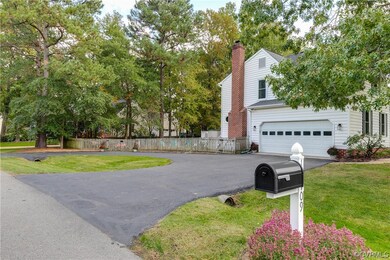w/ 2-car garage and circular paved driveway