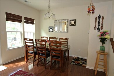 The dining area is open to the kitchen and outdoor