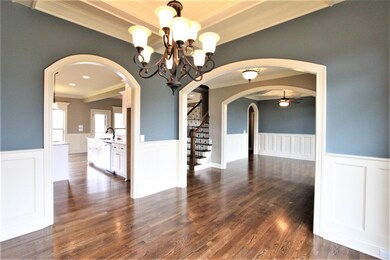 Formal Dining Room With Access To Kitchen