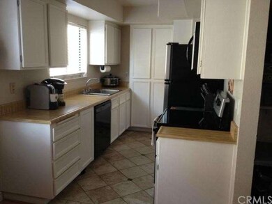 Kitchen with newer ceramic tile and appliances