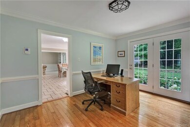 Living Room- 11 x 13, hardwood floor, light fixtur