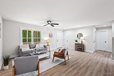 Large family room open to kitchen and dining
