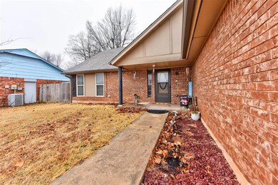 Property entrance featuring central AC unit