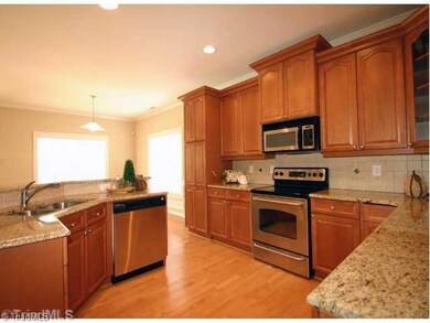 Kitchen. Kitchen opens into large breakfast area.