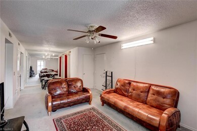 Living room with attached dining area.