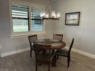 Single story home with decorative driveway, a gara