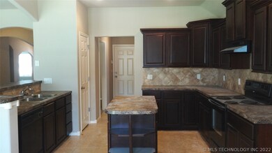 Extra large kitchen with tons of cabinets and coun