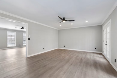 Dining room that could be used as second living room / family room opening onto the private patio.