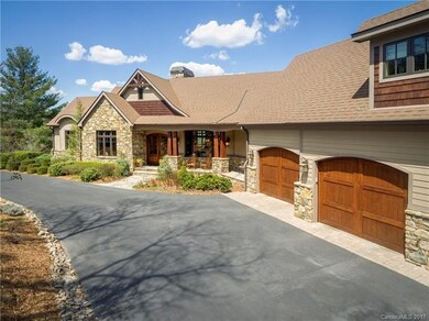 The Three Car Garage Completes This Sprawling Moun
