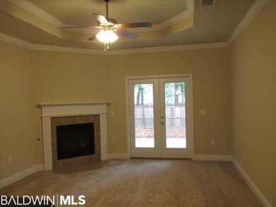 View of Living Room - note tray ceiling w/crown, g