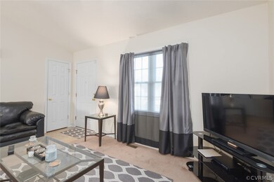 Living Room has Carpet, Coat Closet!