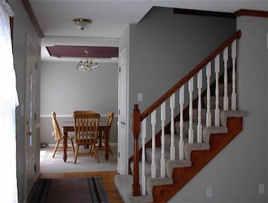 Entryway looking into formal dining.