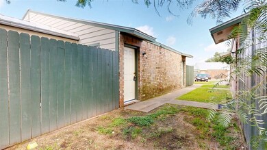 View of home's exterior featuring brick siding
