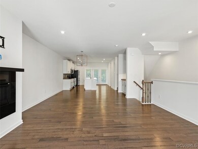 Open Great Room Runs Through Dining Area And Kitchen.