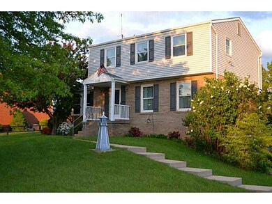 Exterior Front. Nicely landscaped with concrete wa