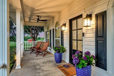 Beautiful covered front porch welcomes you to this awesome home