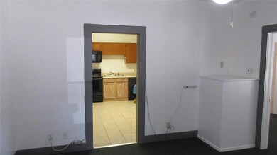Living room looking into kitchen