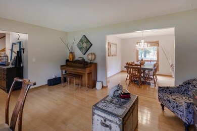 View from living room into entry area and formal d