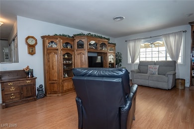 Living area with light wood-style flooring