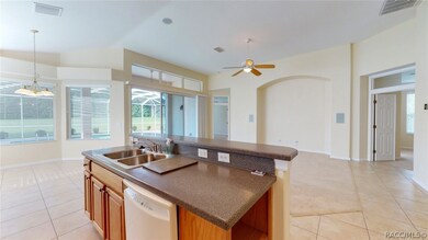 Kitchen Facing the Living Room W/ The Master Bedroom Located to the left and the Office connected to the Master to the right