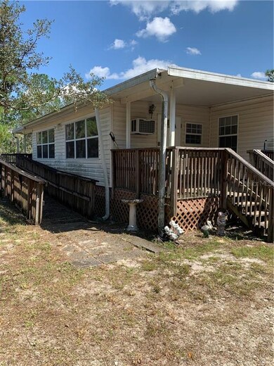 Side porch and ramp to back porch