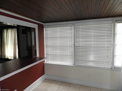 Enter into this sunny breakfast room through the b