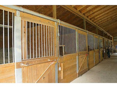 Stable/Barn. The six stalls all have wood floors, 