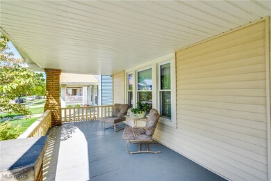 View of patio with covered porch