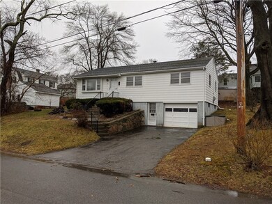 Walk to all the events in downtown Westerly from a convenient rental Ranch at 32 Spring Street just off of Cross Street. The living room opens up to the kitchen and dining room while down the hall are the three bedrooms with nice hardwood floors and a bathroom.  Next to the kitchen is a three season porch with both windows and screens.  The attached garage is part of the unfinished basement. The backyard is perfect for grilling and badminton!  Check it out!