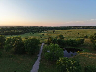 View of property location with a nearby body of water and rural landscape