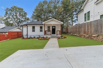 Bungalow-style home with a porch